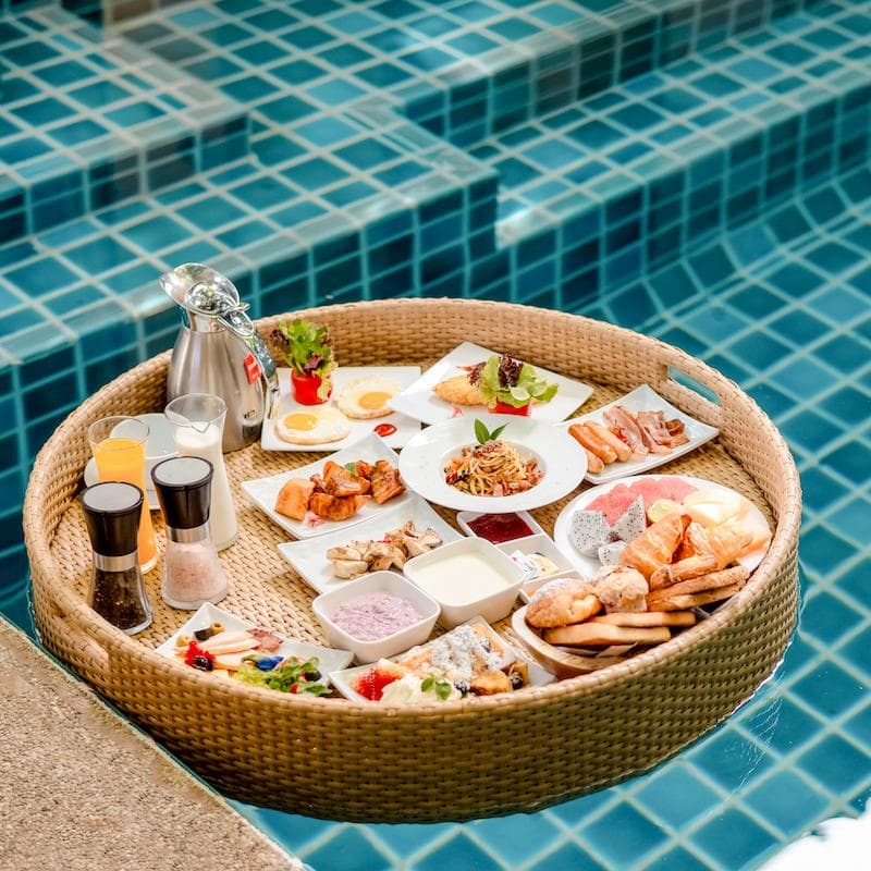 Floating breakfast tray in a villa pool